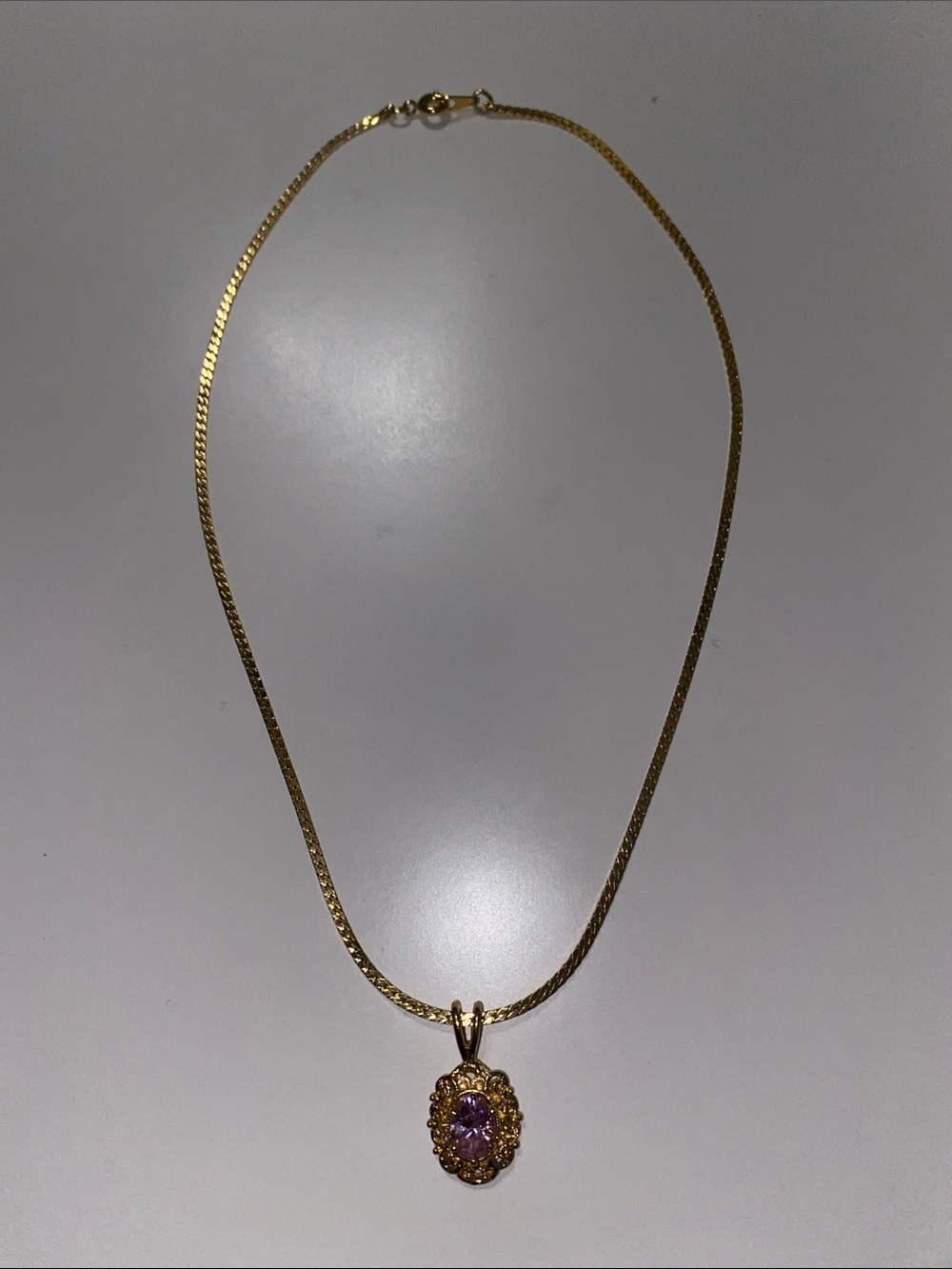 Gold Tone Chain Necklace with Pink Gem Pendant